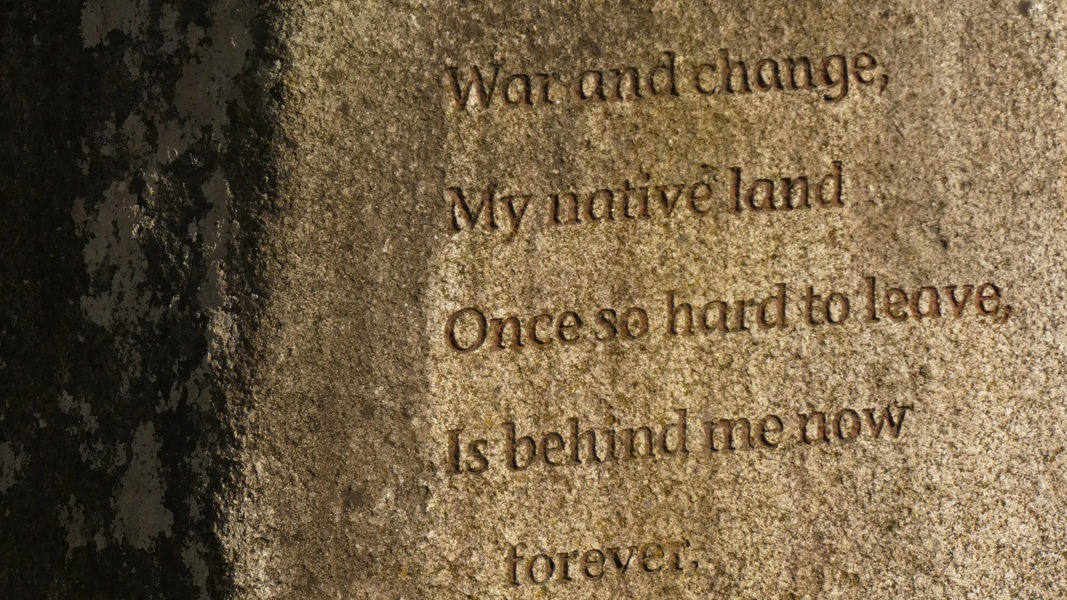Poem engraved on stone at the Japanese American Plaza: "War and change, my native land once so hard to leave, is behind me now forever."